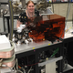 Natalie Curran working with a mass spectrometer.